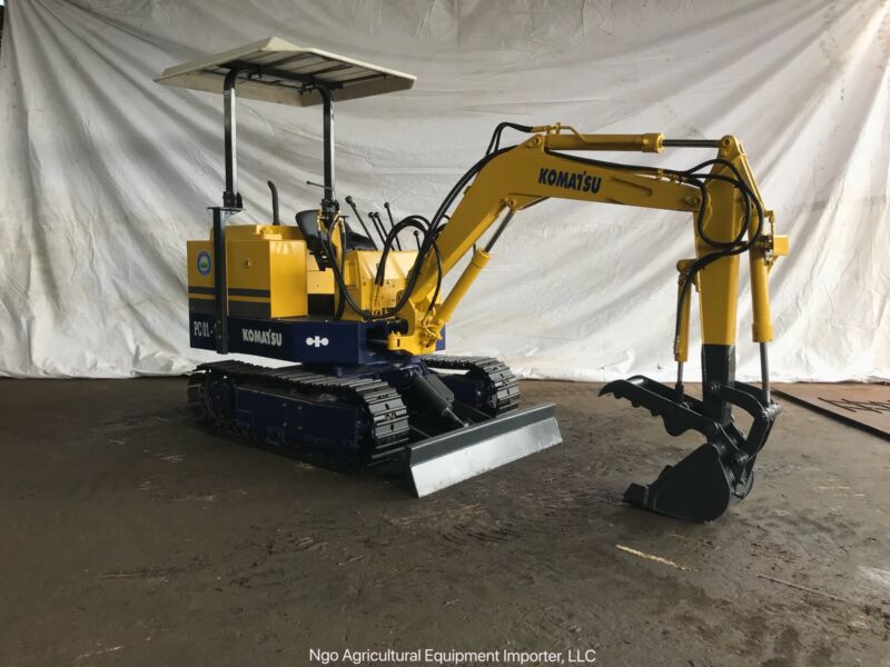 Komatsu PC011 Mini Excavator With Hydraulic Thumb for sale from United